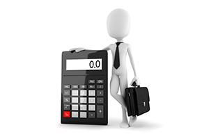 business man standing near a calculator